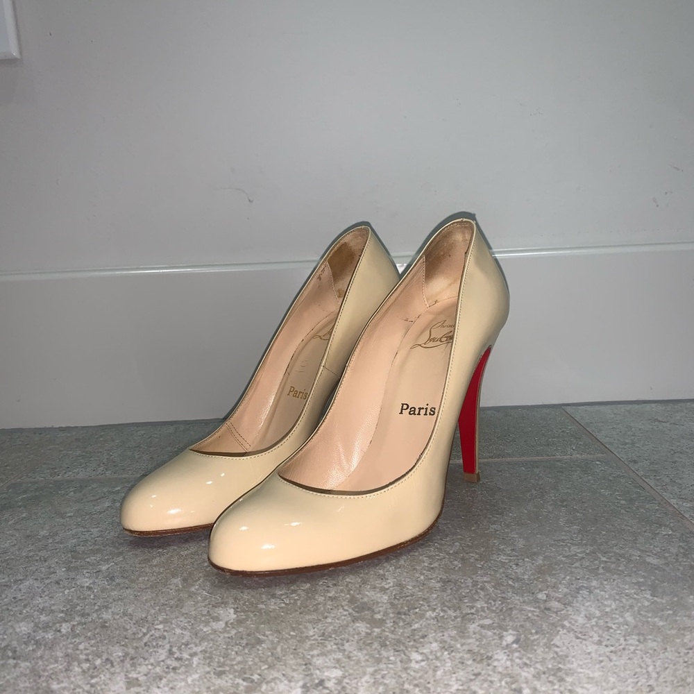 Christian Louboutin beige round toe stiletto pump, 4 inches tall.